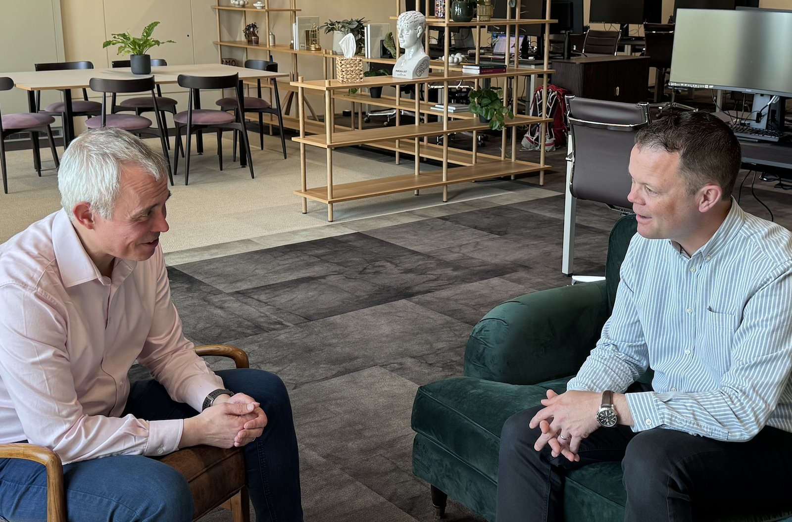 Matthew Dashper-Hughes coaching Rich Roberts in a modern office setting – used by kind permission of Rich Roberts