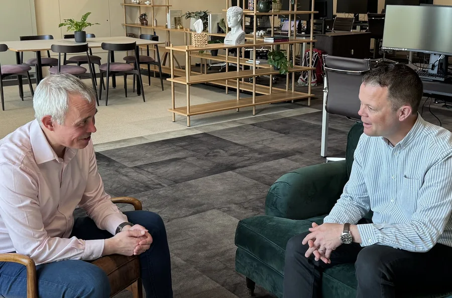Matthew Dashper-Hughes coaching Rich Roberts in a modern office setting – used by kind permission of Rich Roberts